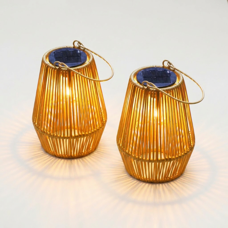 Rattan solar lanterns shown in two sizes on white background
