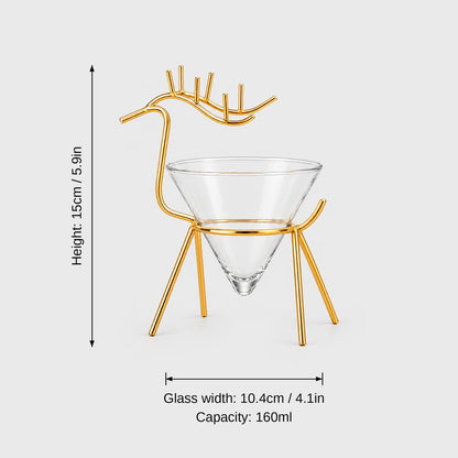 Gold reindeer stand with a clear cone glass on a light grey background with dimensions labeled Height 15 cm or 5.9 in, Glass width 10.4 cm or 4.1 in and Capacity 160 ml