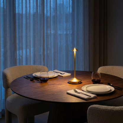Remi indoor outdoor table lamp on dining table by window