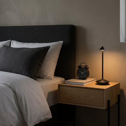 Remi indoor outdoor table lamp on bedside table in neutral bedroom