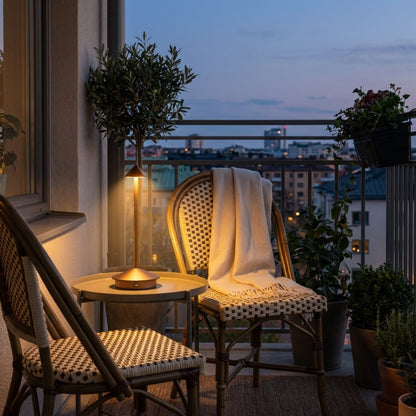 Remi indoor outdoor table lamps on balcony at night