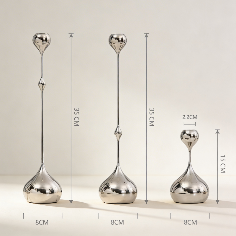 Three silver decorative vases with measurements on a beige background