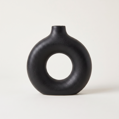 Black Sculptural Ring Ceramic Vase hero shot on a clean off-white studio background