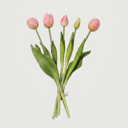 Faux silicone tulip stems in pale pink on white background