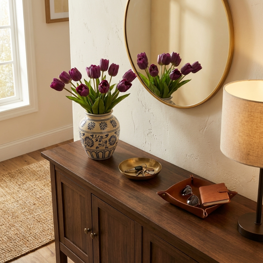 Faux silicone tulips in purple bouquet on console table