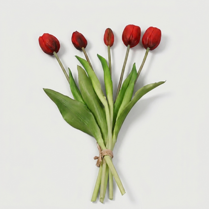 Faux silicone tulip stems in red on white background