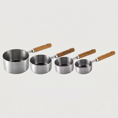 Silver measuring spoons set of 4 on white background