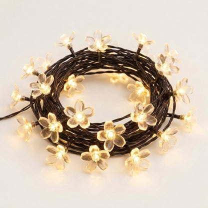 Warm white solar blossom flower garden string lights coiled, Kiyo Home