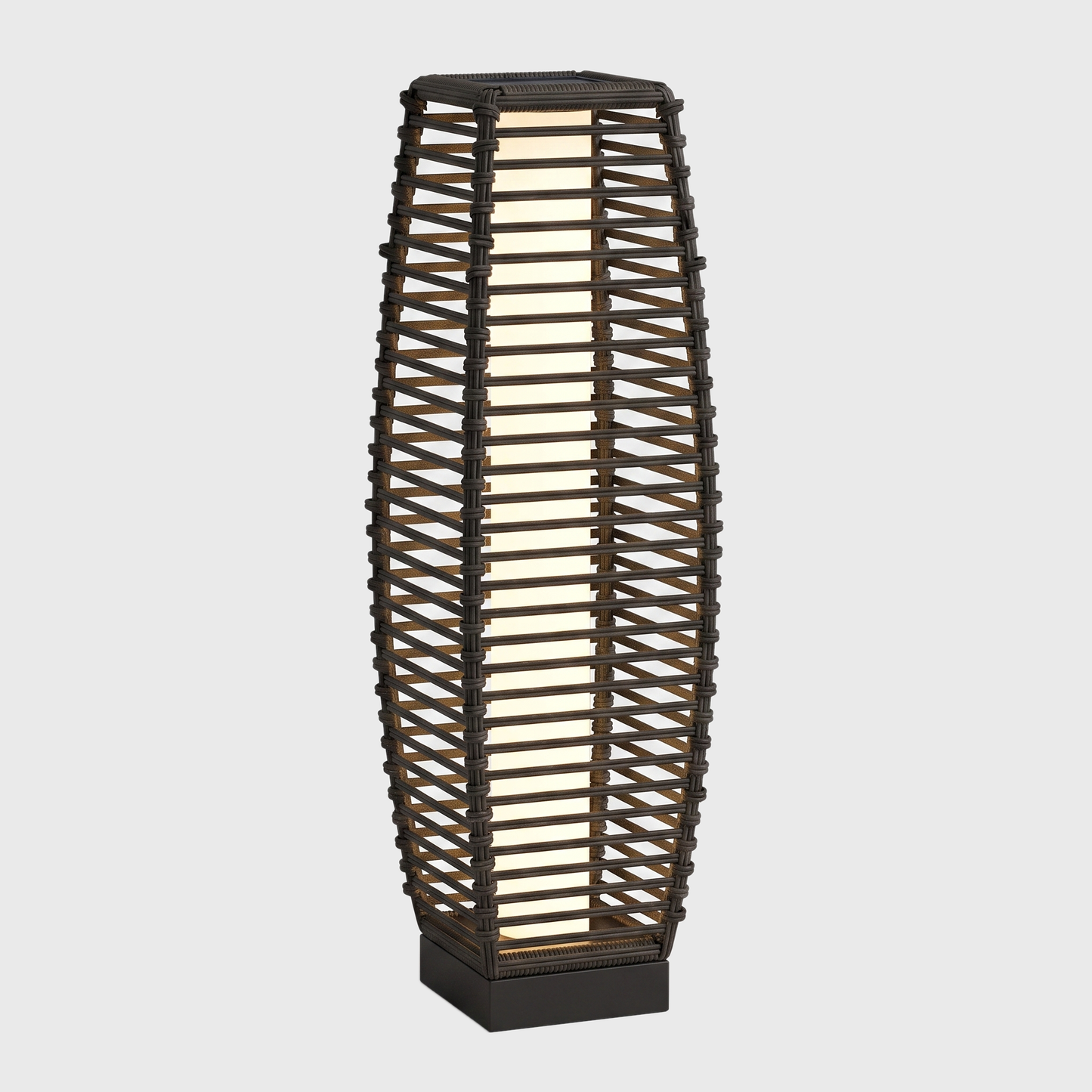 Modern outdoor solar floor lantern glowing on an off-white background