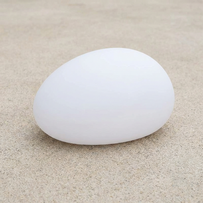 Remote control included with solar pathway stone