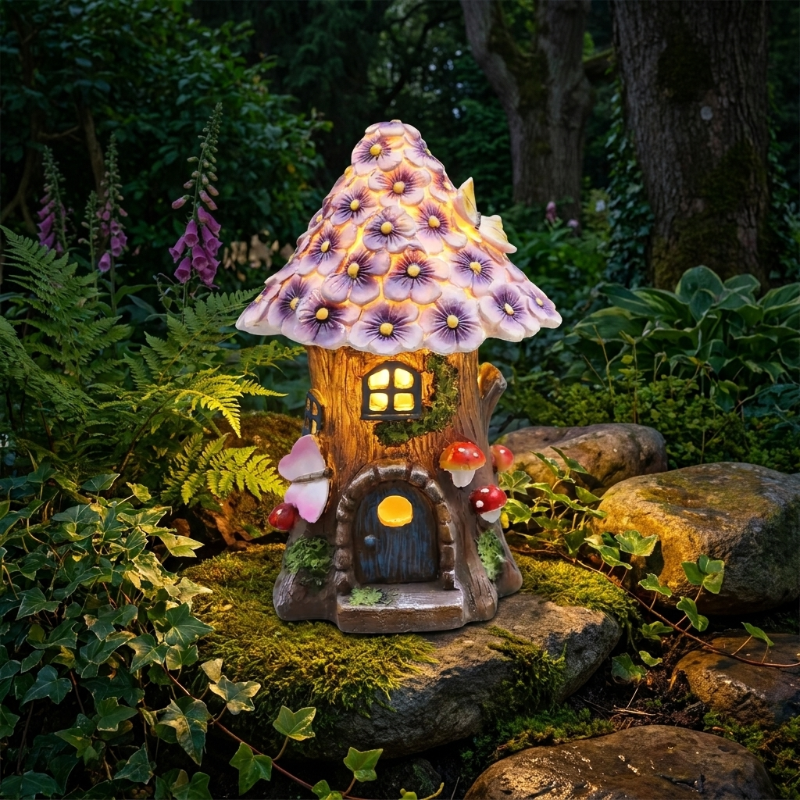 Solar mushroom garden lantern glowing in garden bed at night