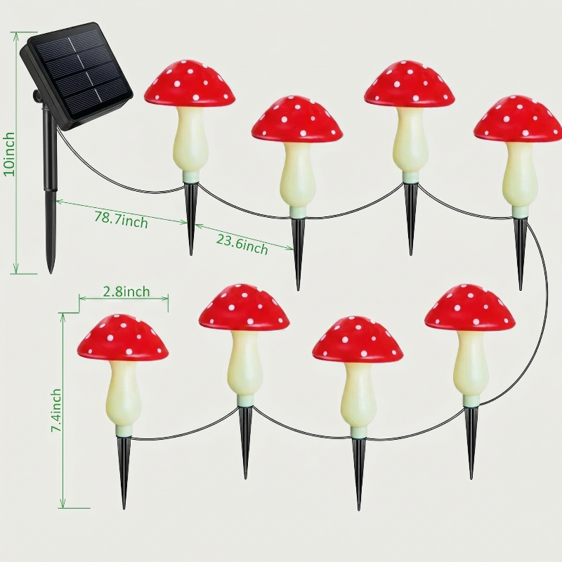 Solar mushroom accent lights with solar panel and red caps on white background