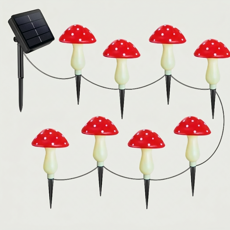 Solar mushroom accent lights with solar panel and multicolor caps on white background