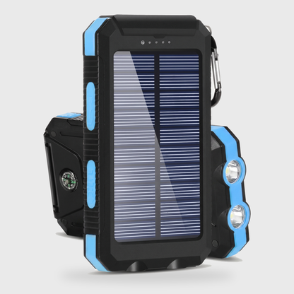Blue solar powered portable charger power bank with a solar panel, dual LED lights, and compass on a clean off-white background