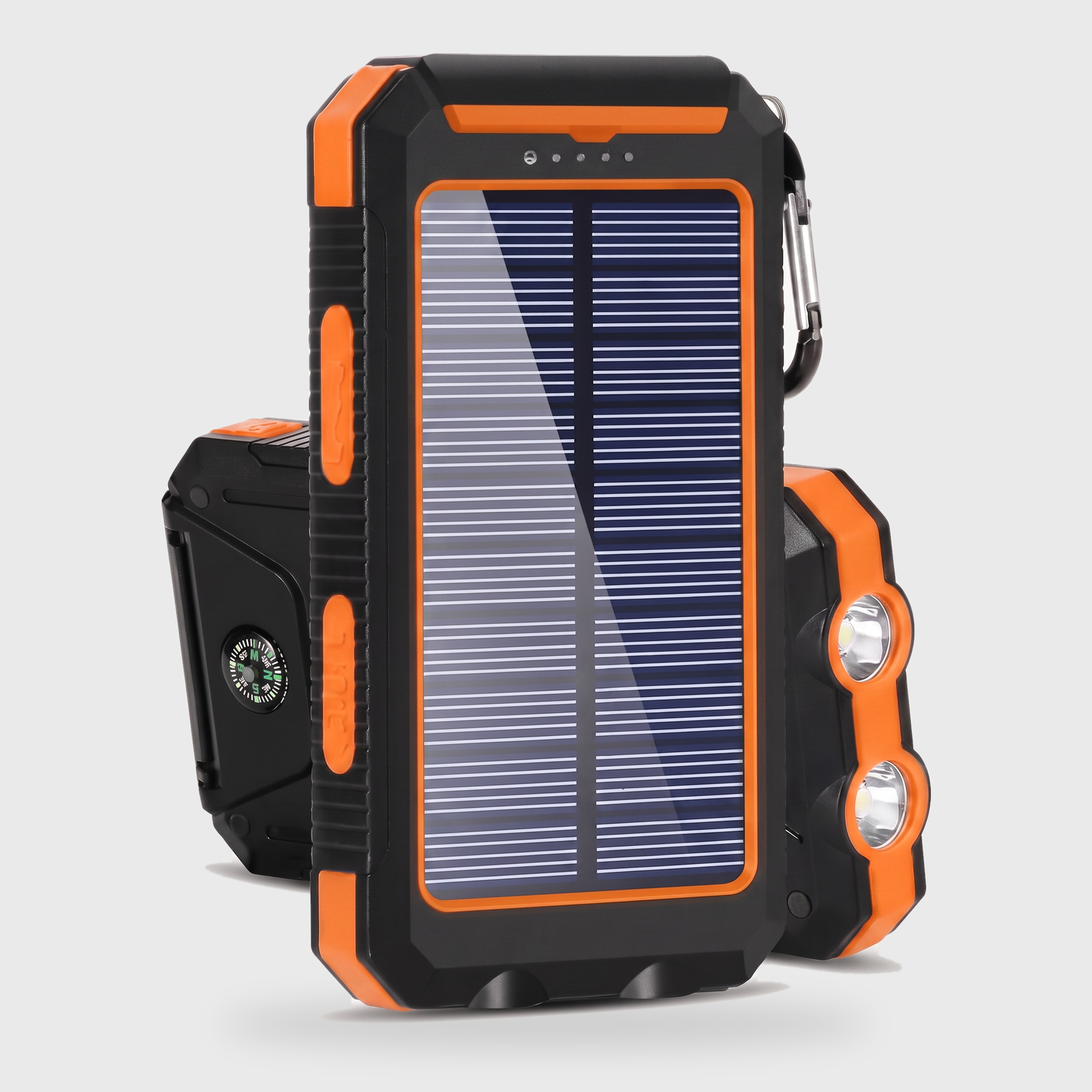 Orange solar powered portable charger power bank with a solar panel, dual LED lights, and compass on a clean off-white background