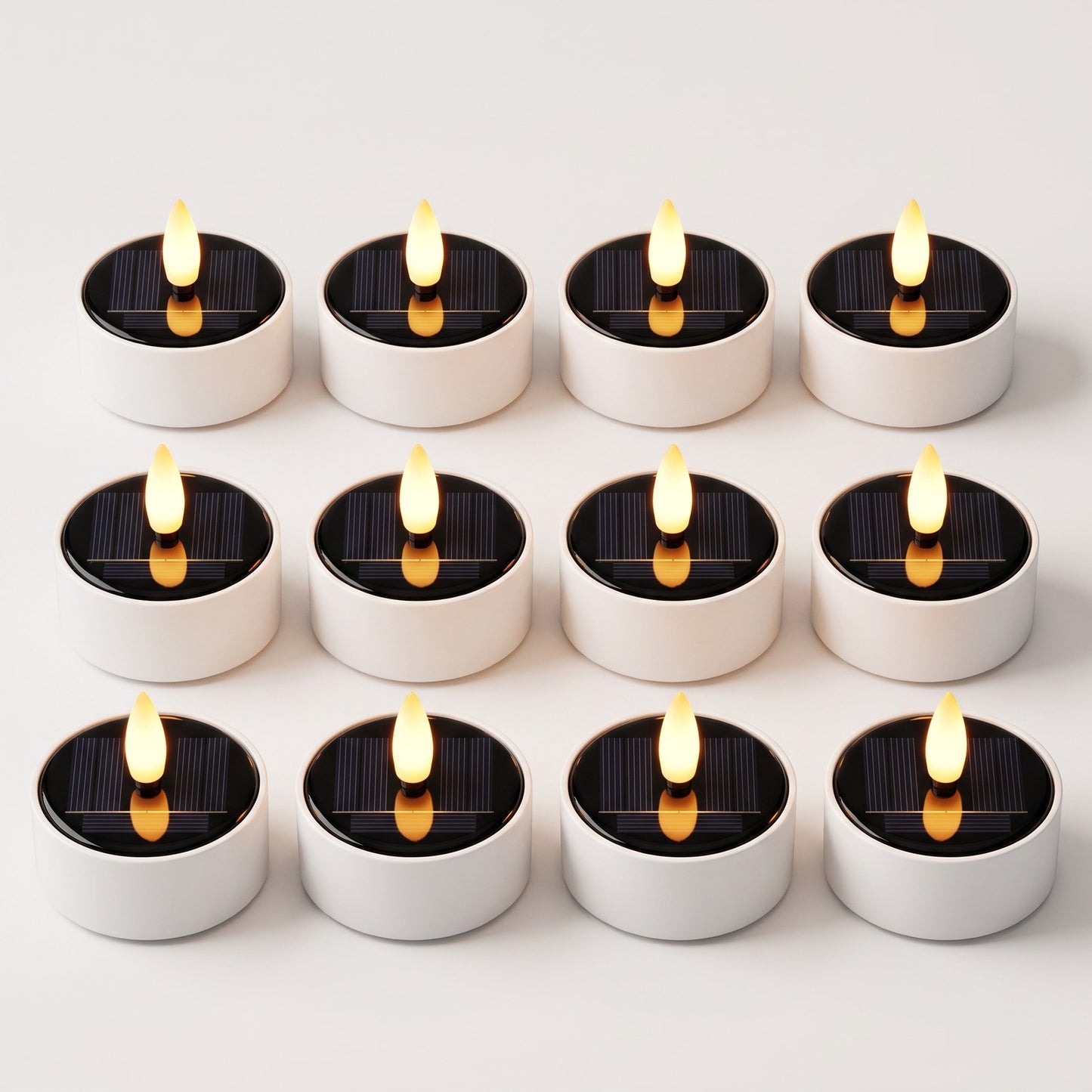 Set of 12 solar LED flameless tea light candles glowing, Kiyo Home