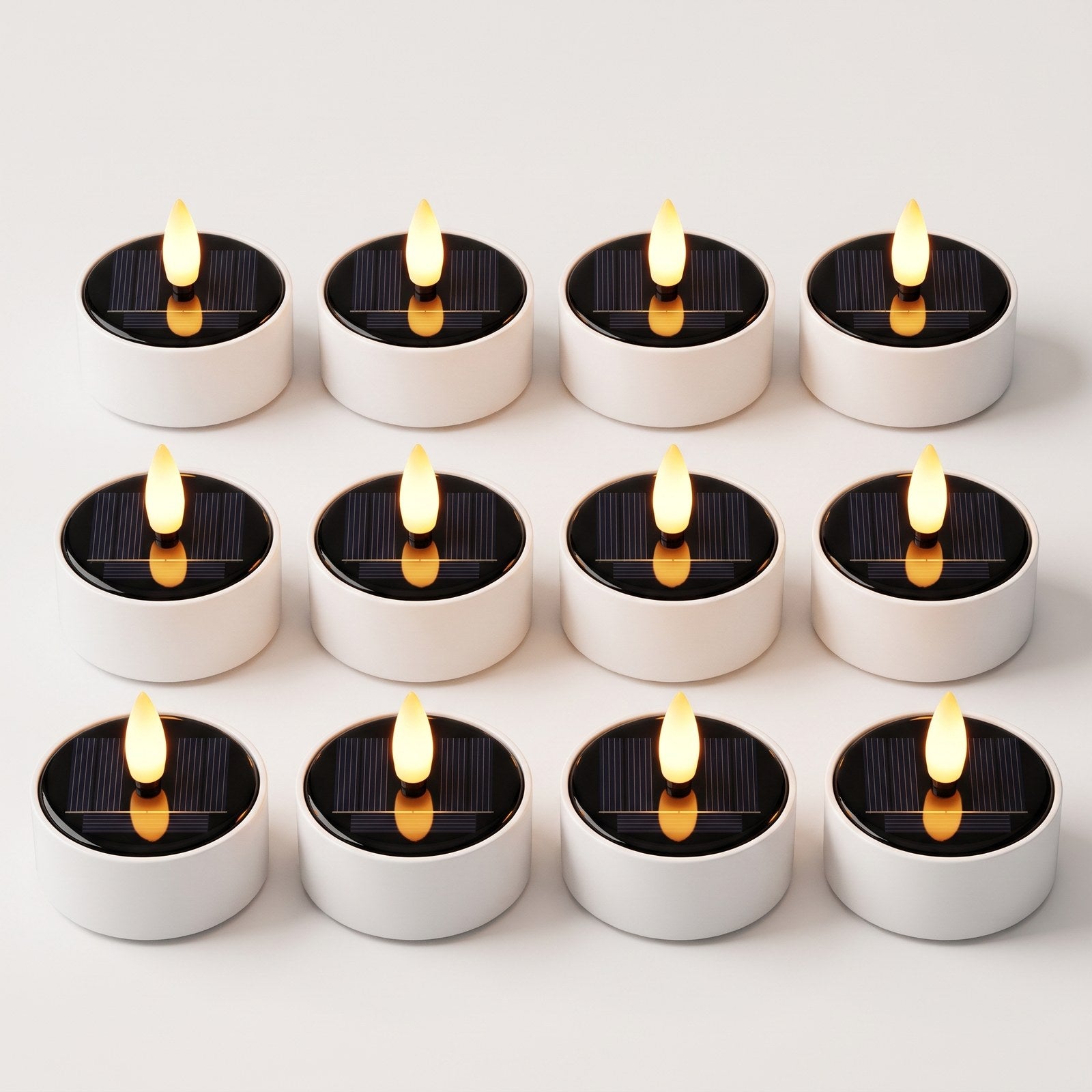 Set of 12 solar LED flameless tea light candles glowing, Kiyo Home
