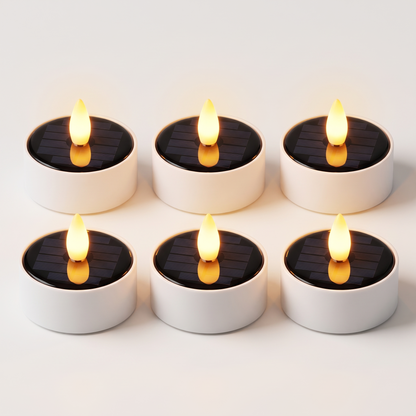 Set of 6 solar LED flameless tea light candles with black solar tops and warm amber flames, Kiyo Home