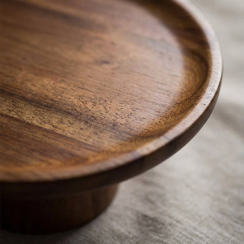 Close-up of a wooden bowl on a textured surface