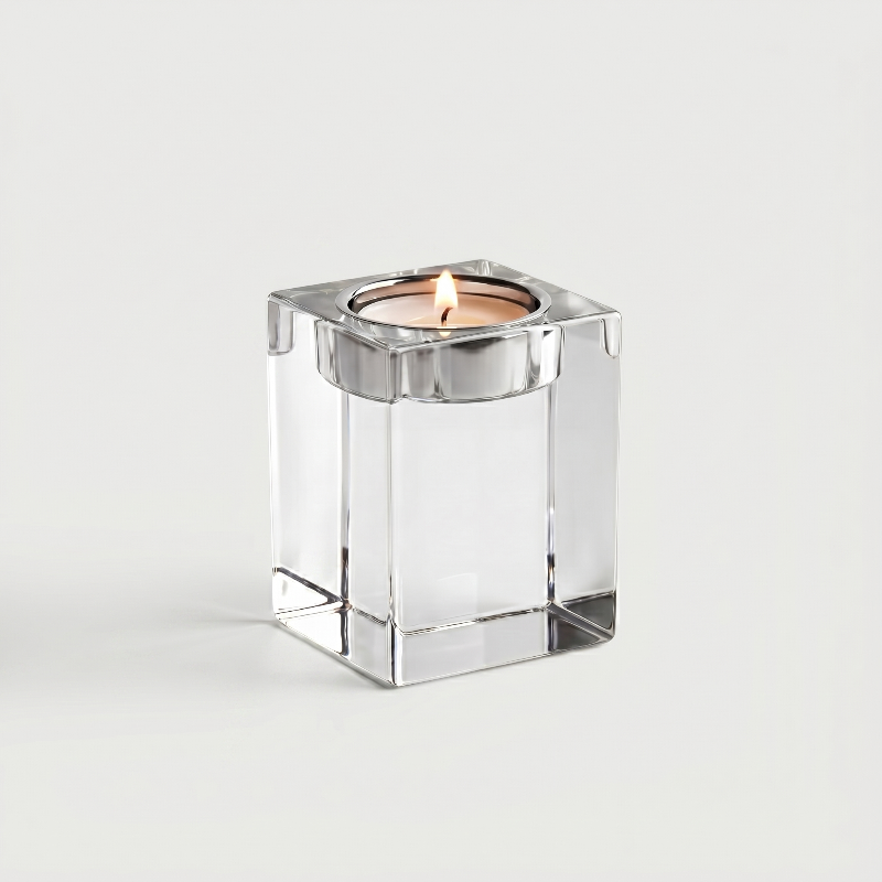 Medium square glass candle holder on white background
