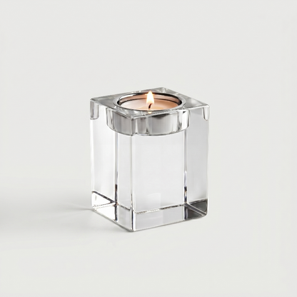 Medium square glass candle holder on white background