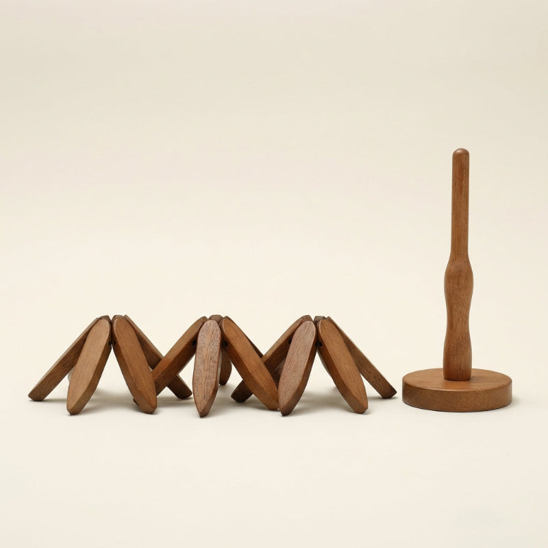 Wooden abstract sculpture on a beige background