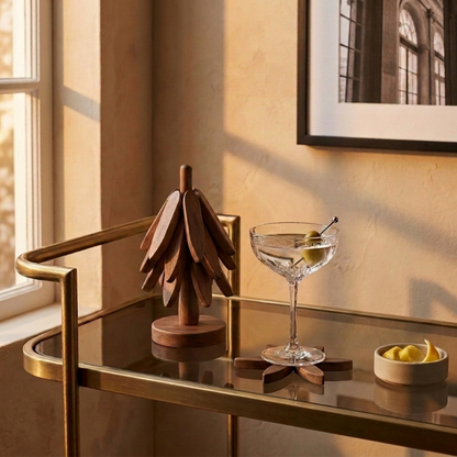 Stacking wood tree coasters on bar cart with drinkware