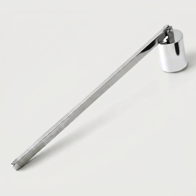 Silver stainless steel candle snuffer on white background