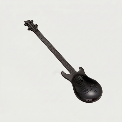 Black stainless steel guitar spoon on white background
