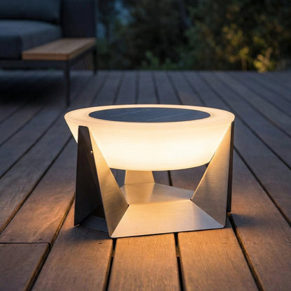 Solar-powered outdoor lamp on a wooden deck