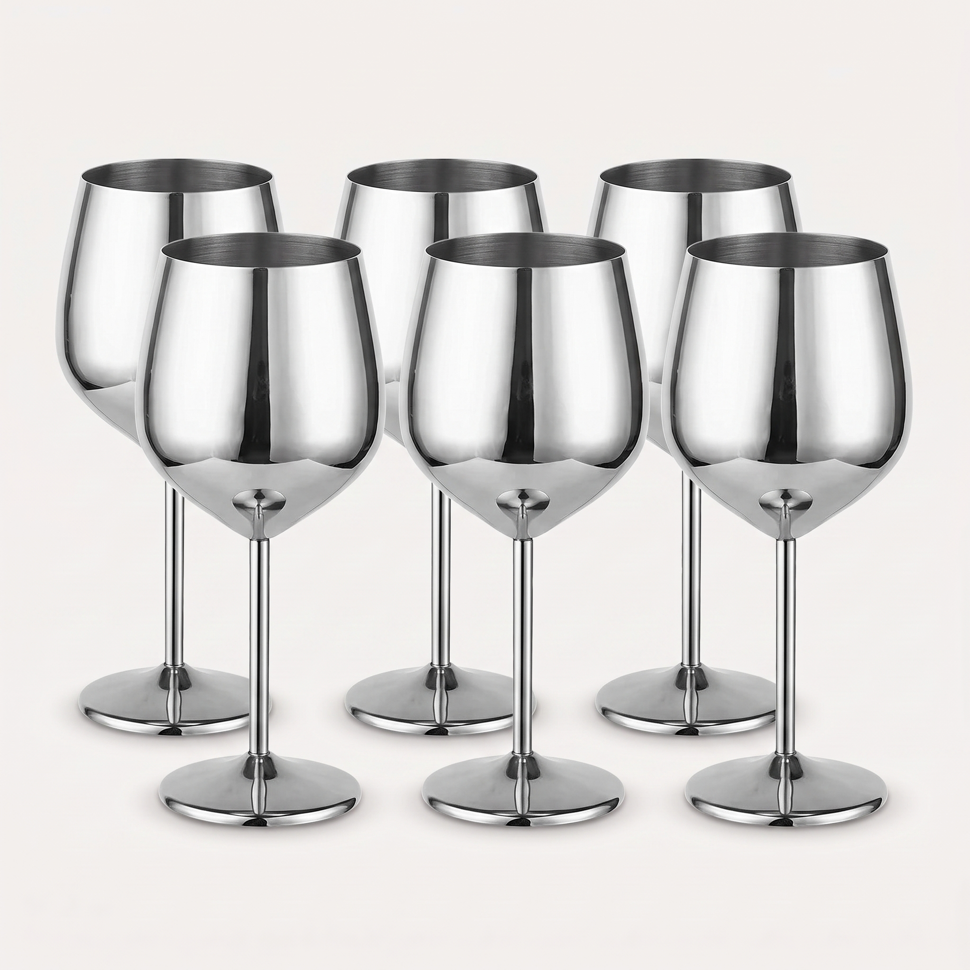 Set of six silver stainless steel stemmed wine glasses with a mirror-polished finish on a clean off-white background