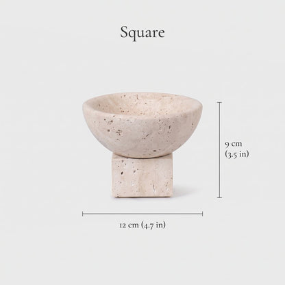 Dimensions graphic of a pale stone pedestal bowl with a square base, width 12 cm or 4.7 in and height 9 cm or 3.5 in