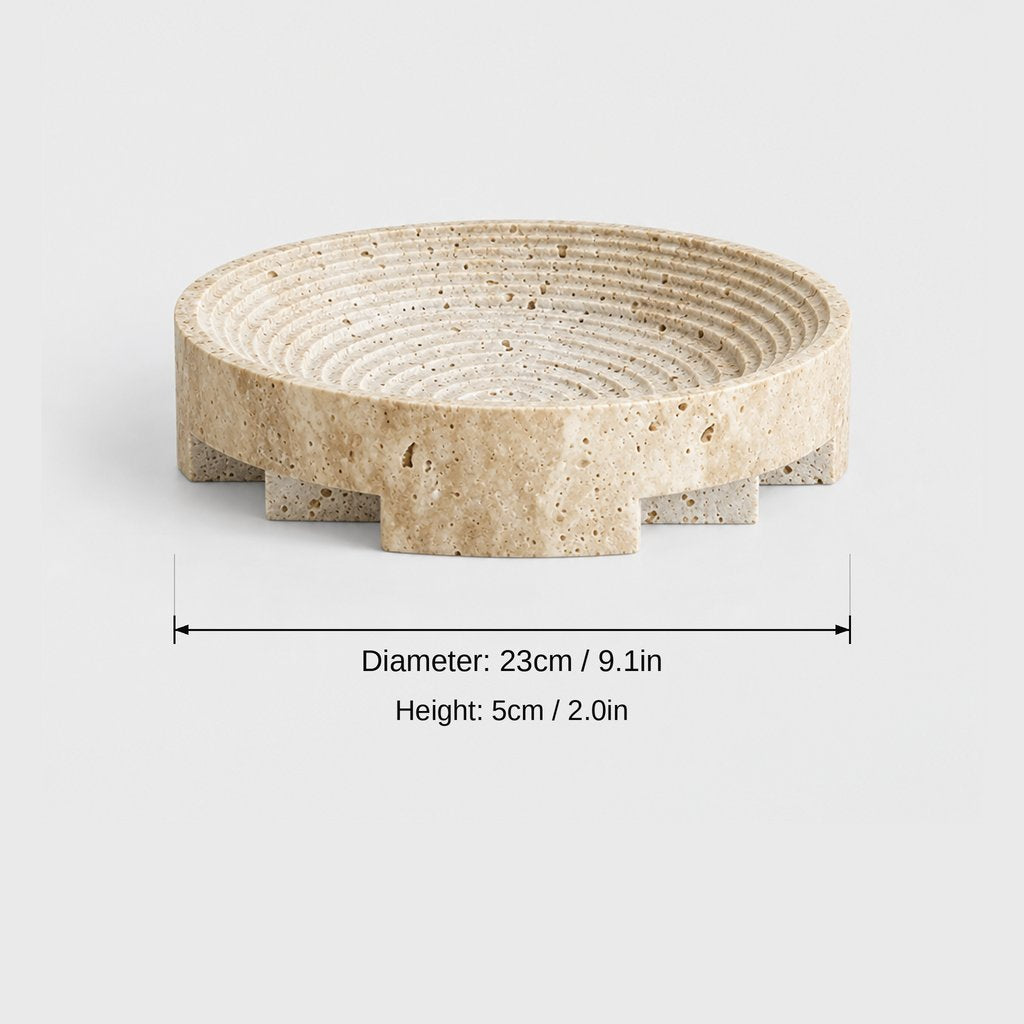 Round pale beige pedestal tray with concentric ridges in the dish and a notched base, dimensions graphic: diameter 23 cm or 9.1 in, height 5 cm or 2.0 in