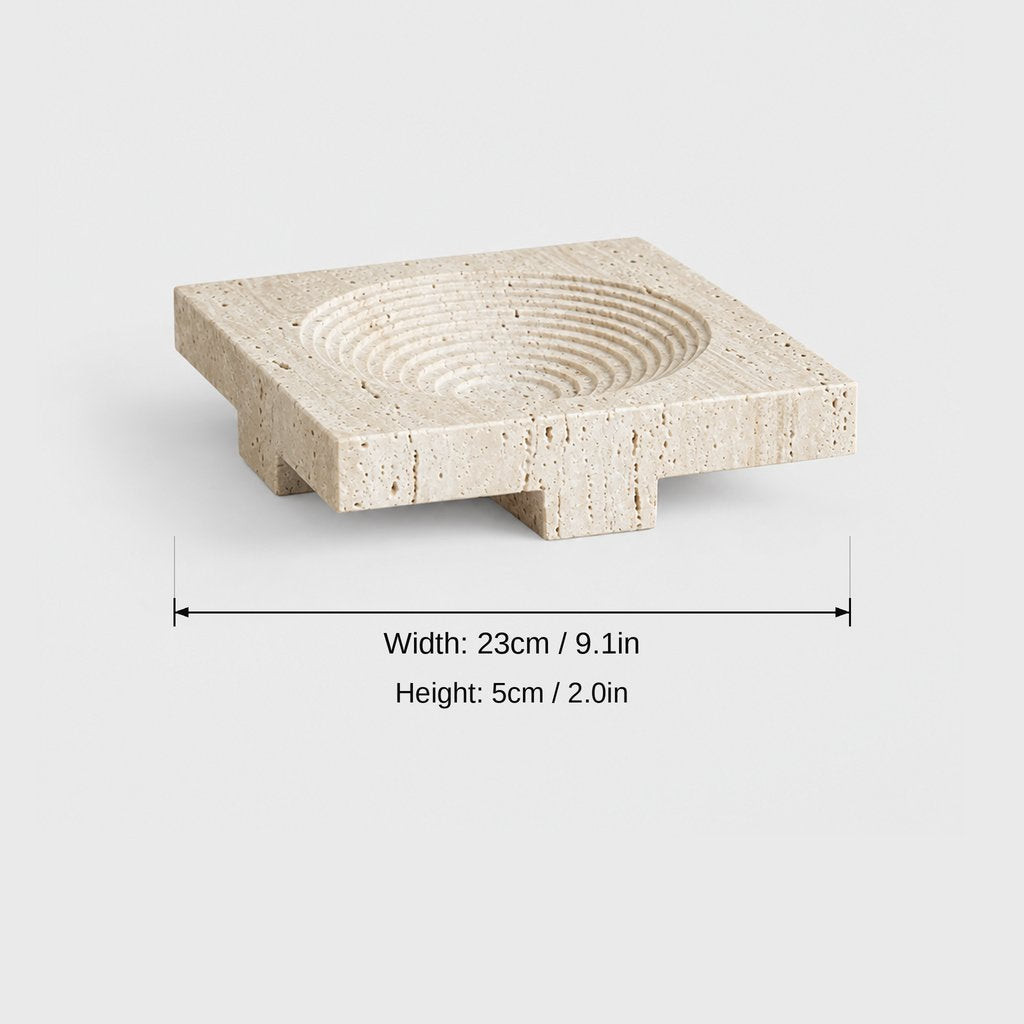 Square pale beige pedestal tray with concentric ridges in the dish, dimensions graphic: width 23 cm or 9.1 in, height 5 cm or 2.0 in