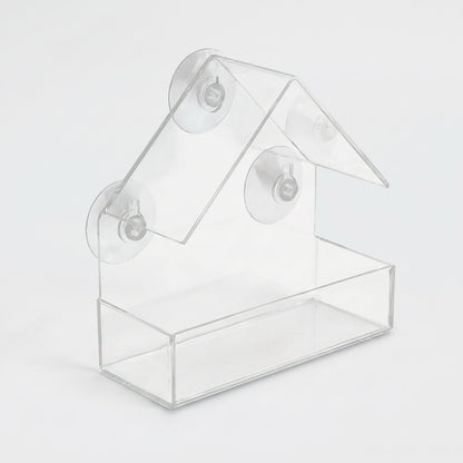 Clear acrylic suction cup window bird feeder in a house shape, for hanging on windows