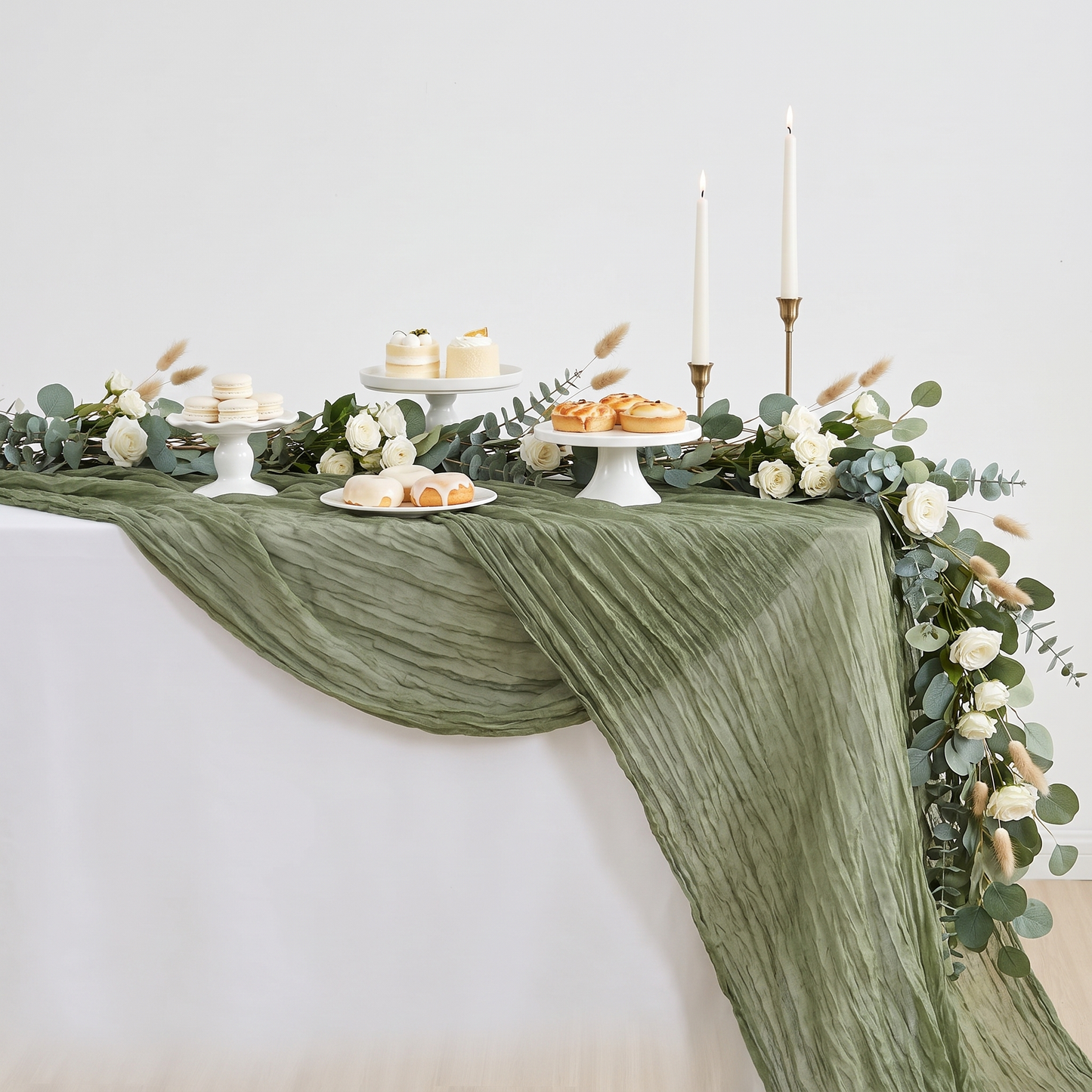 Sage green gauze table runner draped over a wedding dessert table, Kiyo Home 71-inch table runner