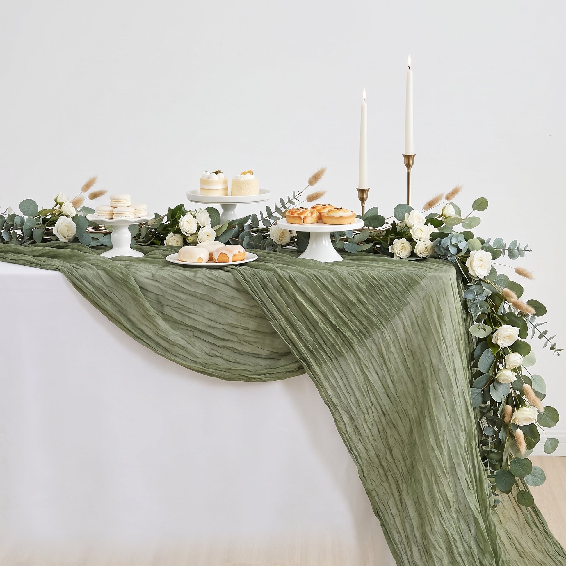 Sage green gauze table runner draped over a wedding dessert table, Kiyo Home 71-inch table runner
