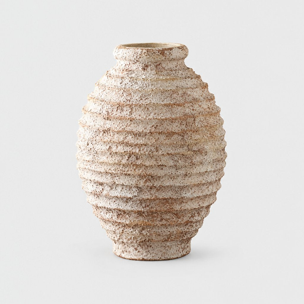 Large tall textured cream and tan vase with horizontal ridges and a narrow rim, on a plain light gray background