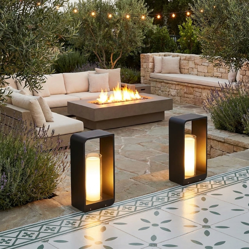 Twilight outdoor solar lanterns on low outdoor table beside lounge seating