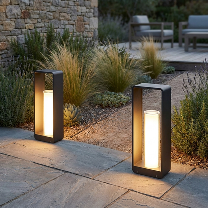 Twilight outdoor solar lantern on garden path in warm evening light