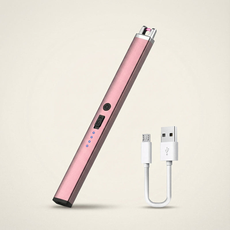 Pink electronic device with USB cable on a beige background