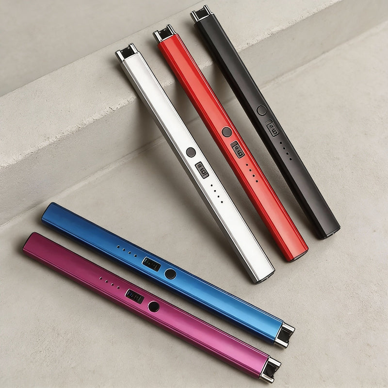 Five electronic devices in red, black, blue, and pink on a light gray surface.