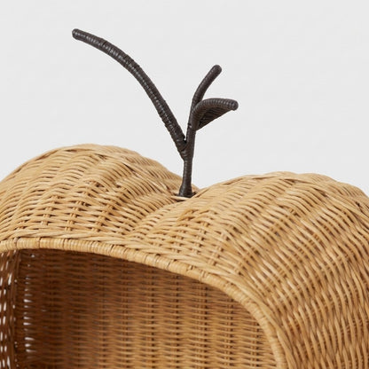 Close-up of the woven branch and stem detail on top of the apple-shaped rattan basket