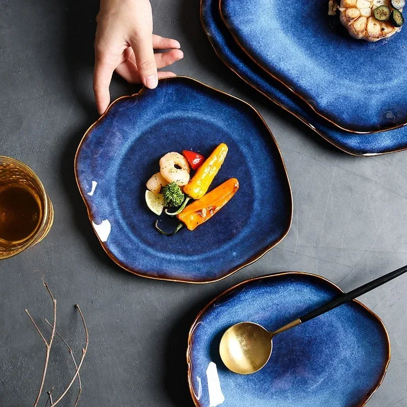 Wave Dinnerware displayed on a dining table with minimalist decor, highlighting the bold blue color and contemporary design.