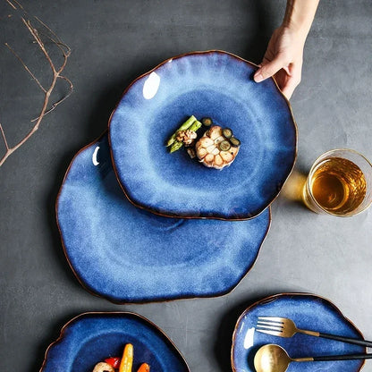 Close-up of the Wave Dinnerware’s smooth, deep blue glaze, showcasing its European-inspired design and artistic shape.