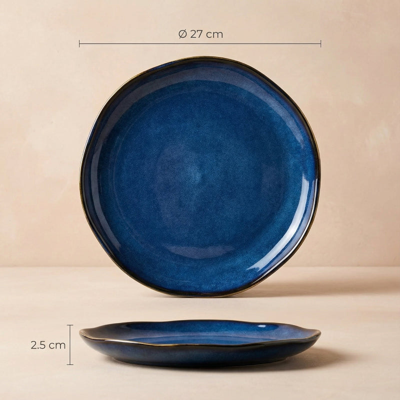 Blue ceramic plate with dimensions on a beige background
