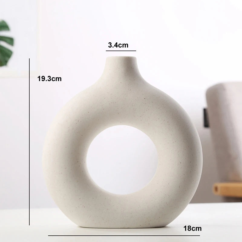 Elegant round vase, perfect for creating a minimalist aesthetic in your living space.