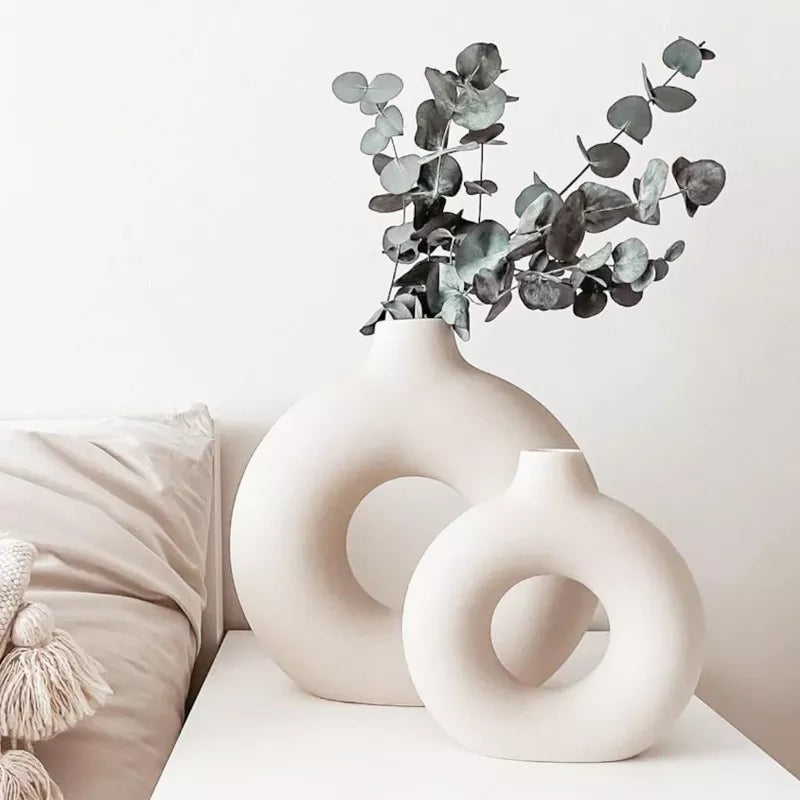 Minimalist circular vase, perfect for enhancing your home decor with its simple beauty.