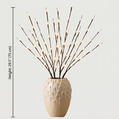 Willow branch LED lights in beige vase on white background