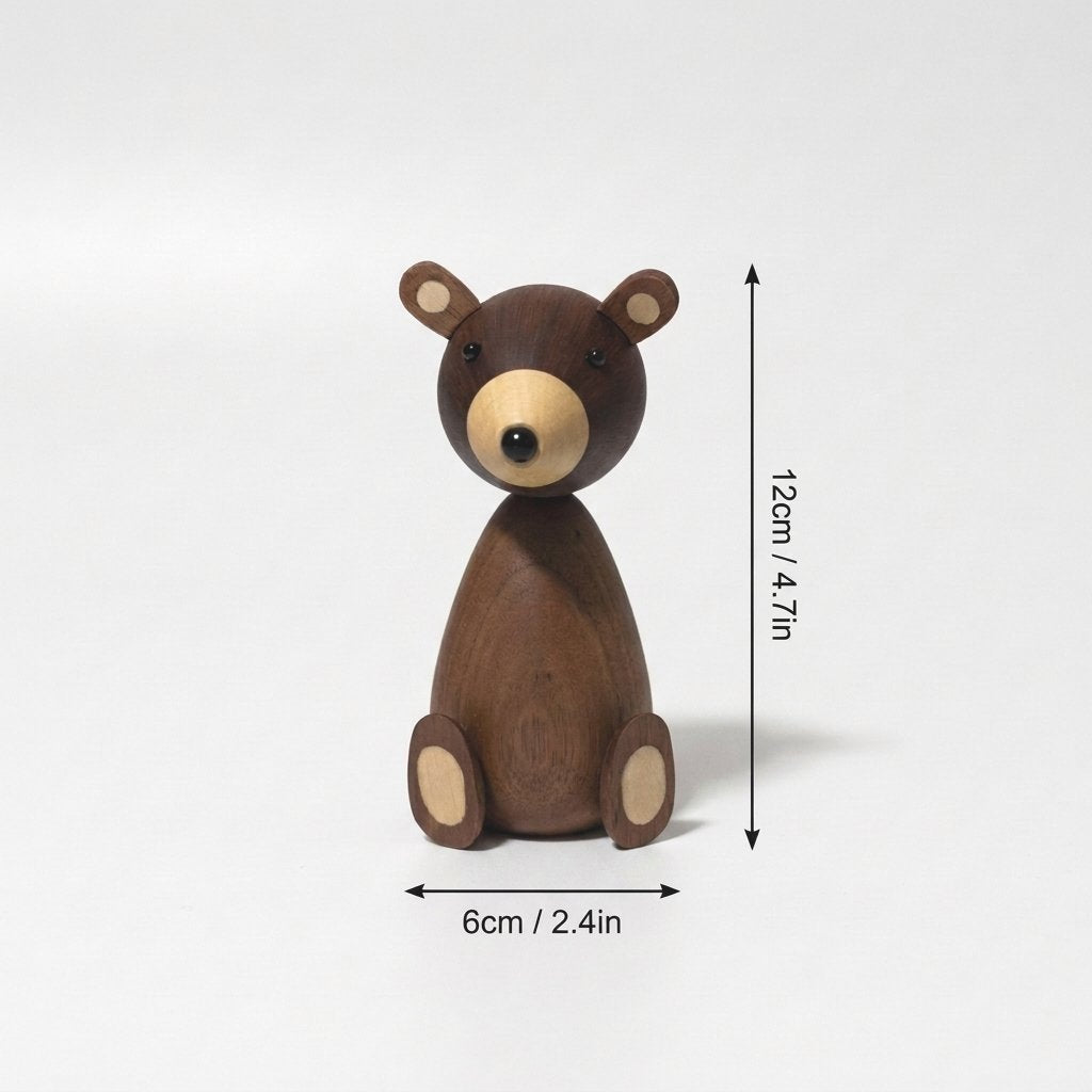 Small wooden bear figurine with arrows showing its height of 12 cm and width of 6 cm